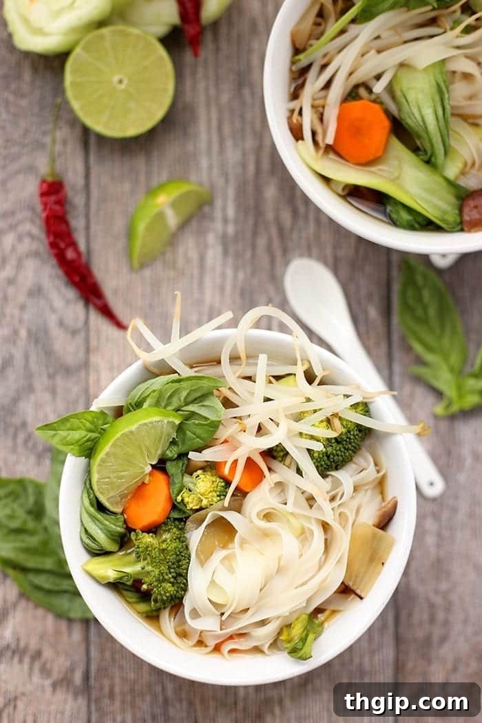 Prepared ingredients for vegetarian pho including roasted onions, ginger, and spices