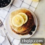 A delicious stack of healthy lemon poppyseed pancakes.