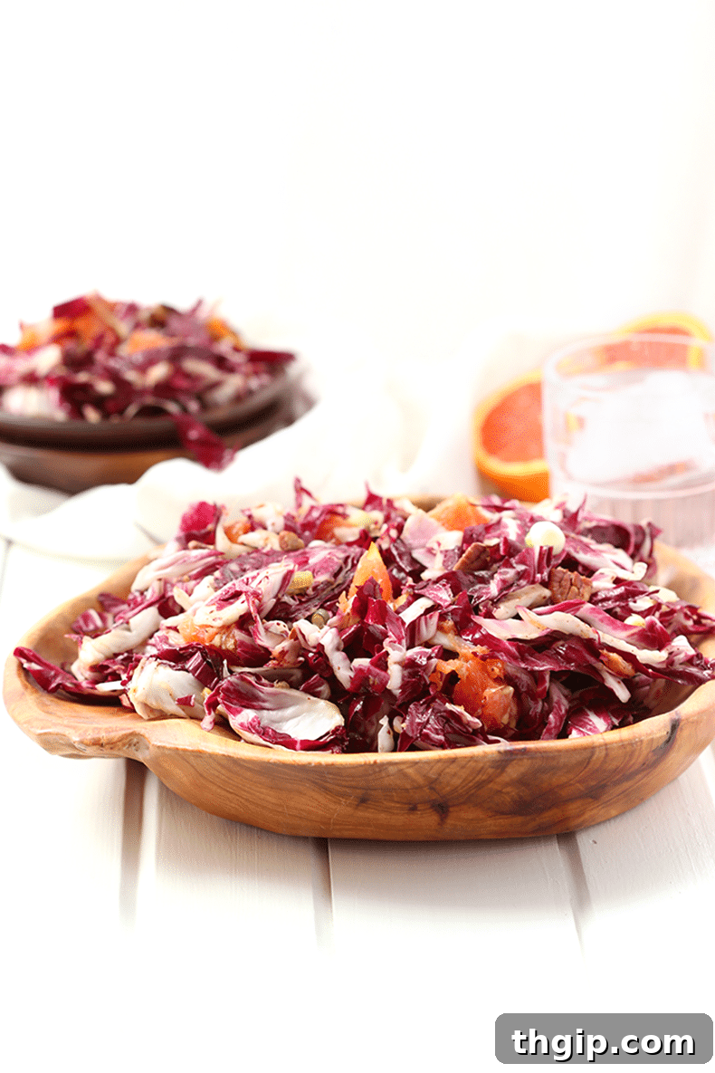 A vibrant Orange Radicchio Salad with a fresh maple vinaigrette, perfect for spring.