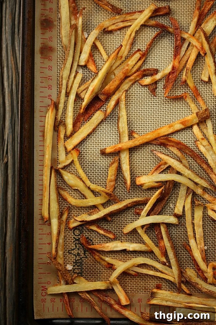 Complete your meal with crispy baked french fries paired with healthy chicken fingers, salmon burgers, or Moroccan lamb burgers for a balanced and delicious dinner.