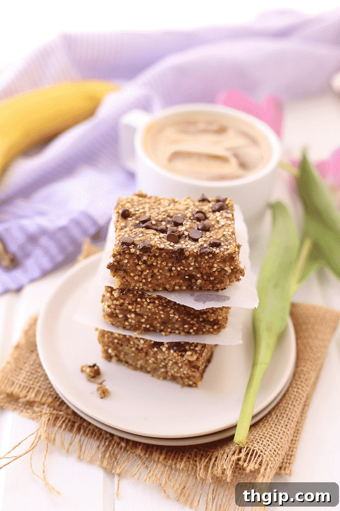 Morning Fuel Banana Quinoa Bars 2 Golden brown banana quinoa breakfast bars, sliced and ready to eat.