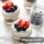 Delicious Vegan Berry Coconut Parfaits in a mason jar.