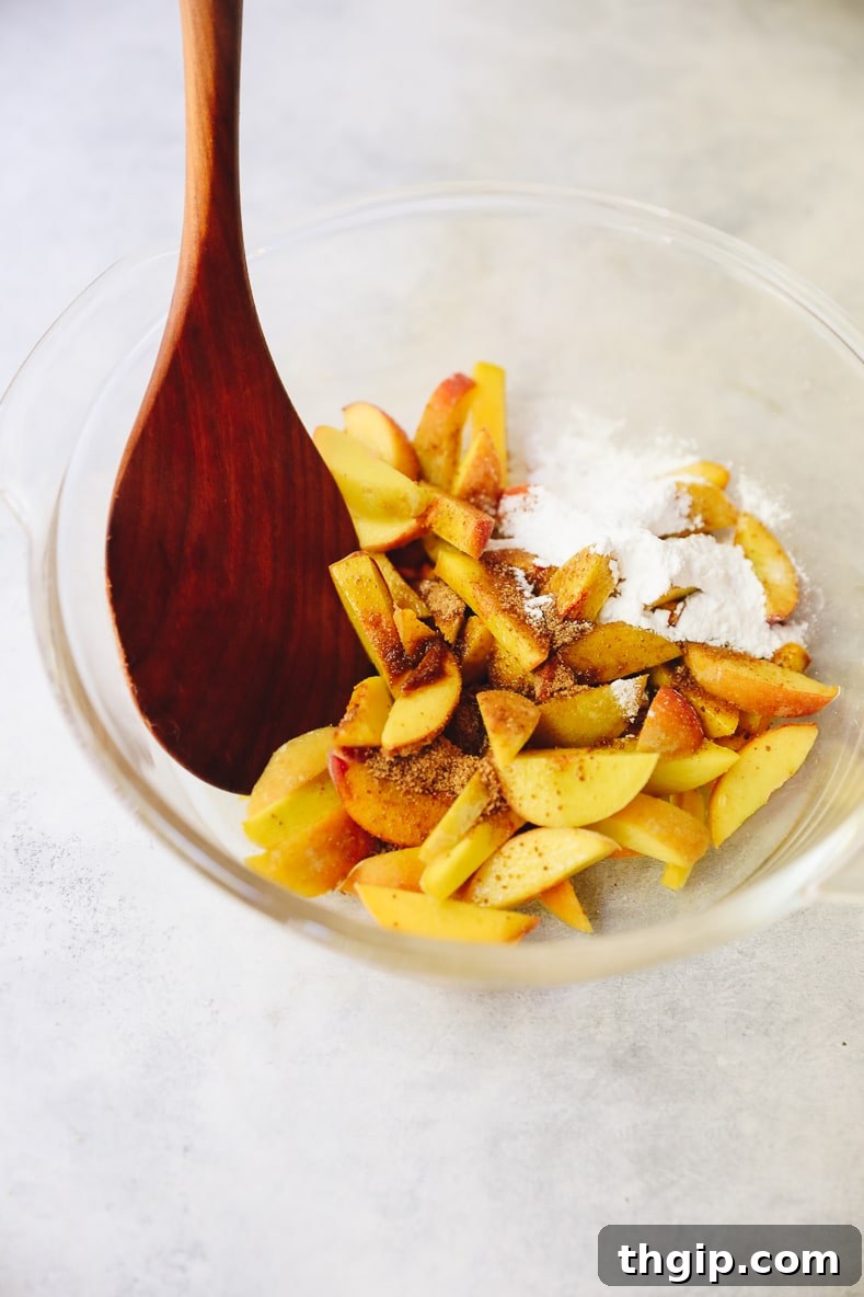 Rustic Vegan Peach Galette 5 Prepared peach filling with sliced peaches, vanilla, coconut sugar, and tapioca flour.