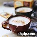 A delicious homemade London Fog latte in a mug, topped with frothy milk and a light sprinkle, ready to be served.