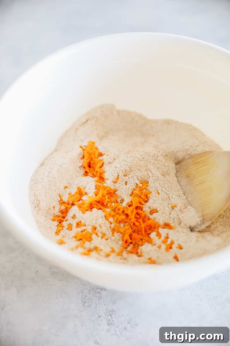 Zesty Orange Rosemary Scones 3 Mixing dry ingredients in a bowl for orange rosemary scones.
