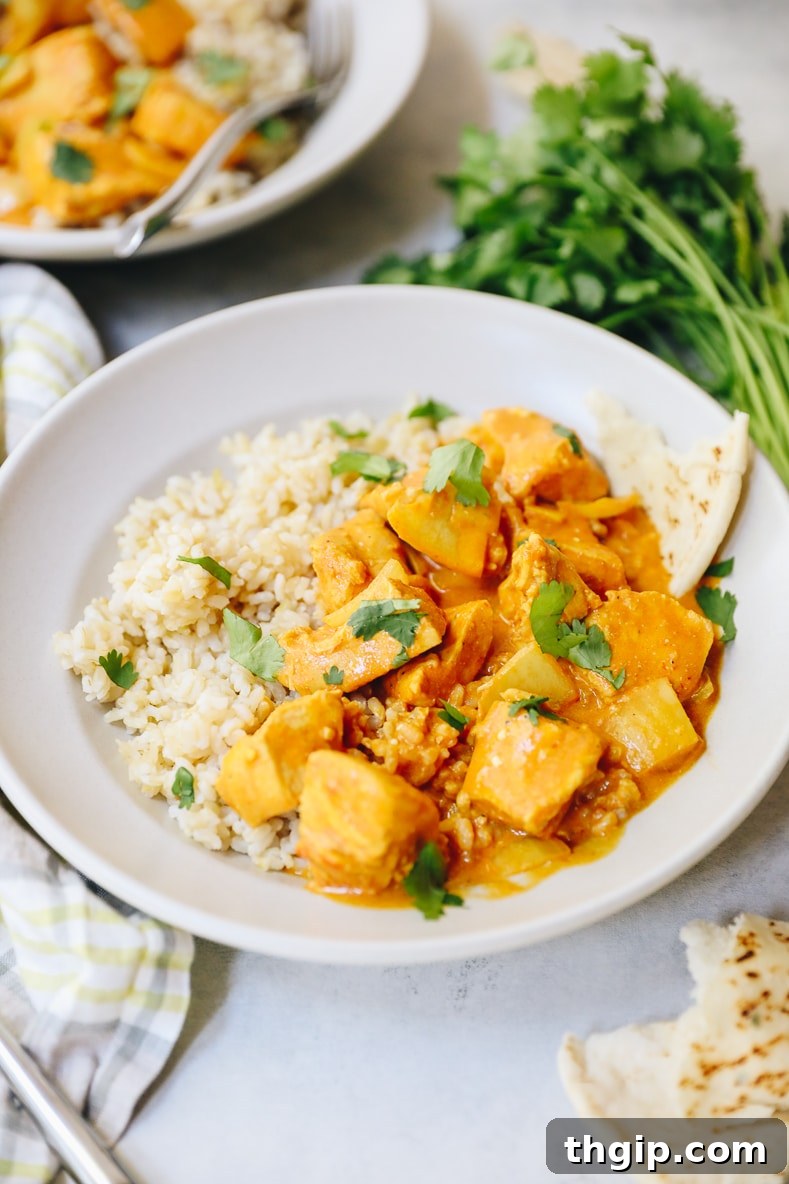 Rich and Creamy Slow Cooker Butter Chicken 2 Delicious slow cooker butter chicken served with rice
