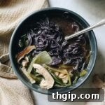 Feeling a little under the weather or in need of a good immune-boost for cold and flu season? This is my go-to healing bowl full of healthy ingredients like mushrooms, miso, chicken broth and veggies.