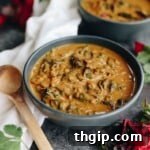 Warm of from the inside out with this flavorful Thai Curry Carrot Lentil Soup. A filling soup recipe to enjoy for lunch or dinner with plenty of plant-based protein and a full serving of veggies! #soup #plantbased #recipe