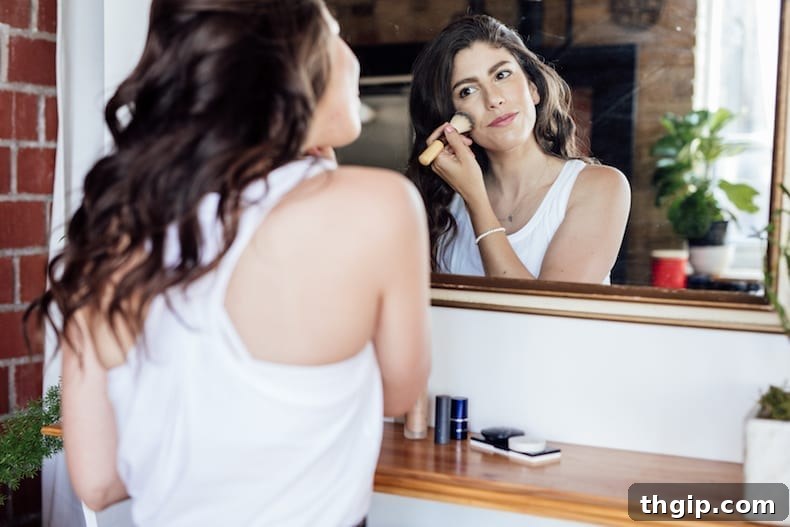 The 2018 Clean Beauty Edit 3 Close-up of clean beauty products: highlighter, eyebrow gel, and mascara.