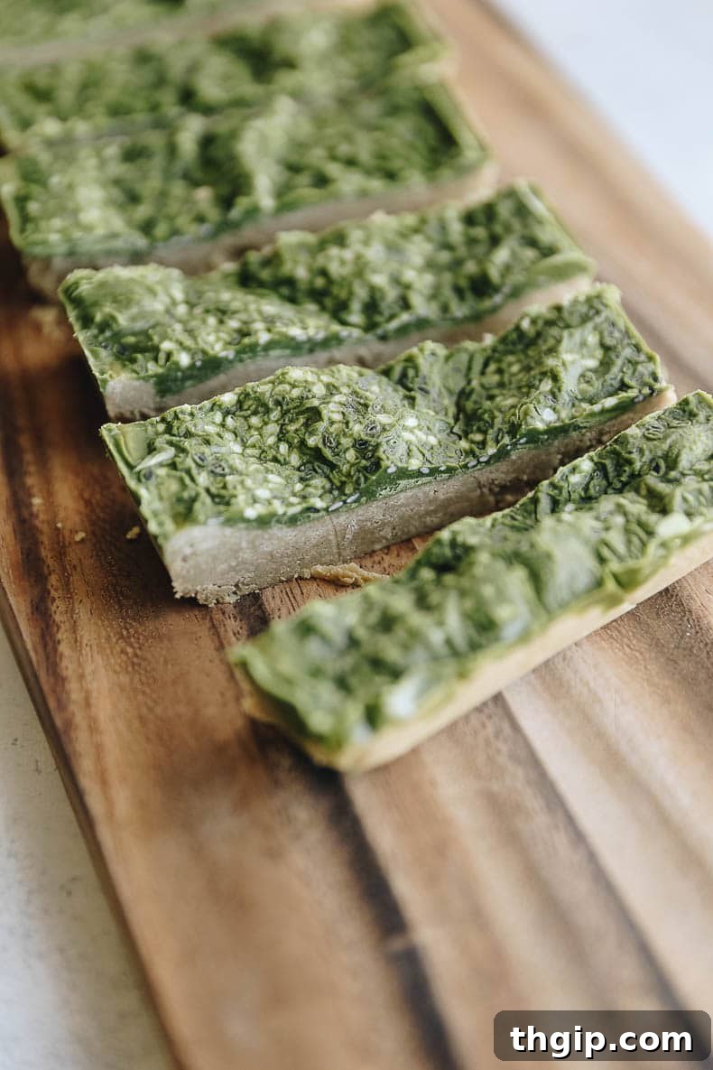 A selection of healthy and easy-to-make snacks, including homemade matcha protein bars, perfect for meal prepping and clean eating.
