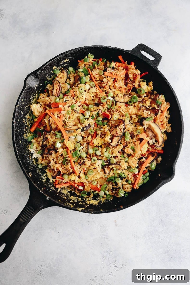 Healthy one-pot kimchi fried rice - an easy weeknight meal made in one cast-iron pot! #castiron #kimchifriedrice