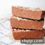 A finished bar of homemade pink clay and oatmeal soap.