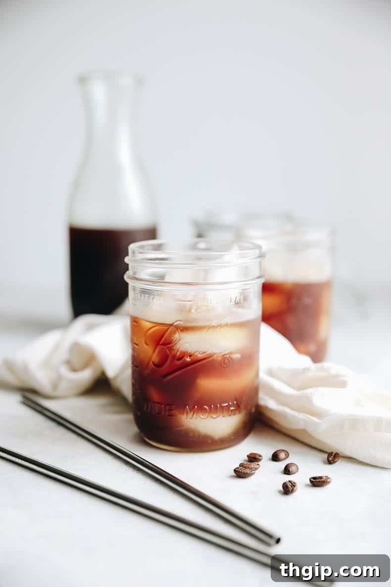 Effortless Homemade Cold Brew Perfection 2 Perfectly brewed cold brew coffee in a clear glass mason jar, ready to be enjoyed.