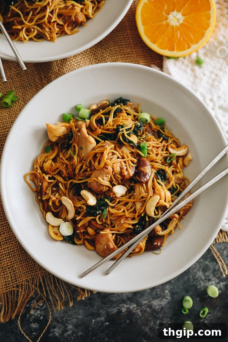 Overhead shot of Orange Sesame Noodles with chopsticks