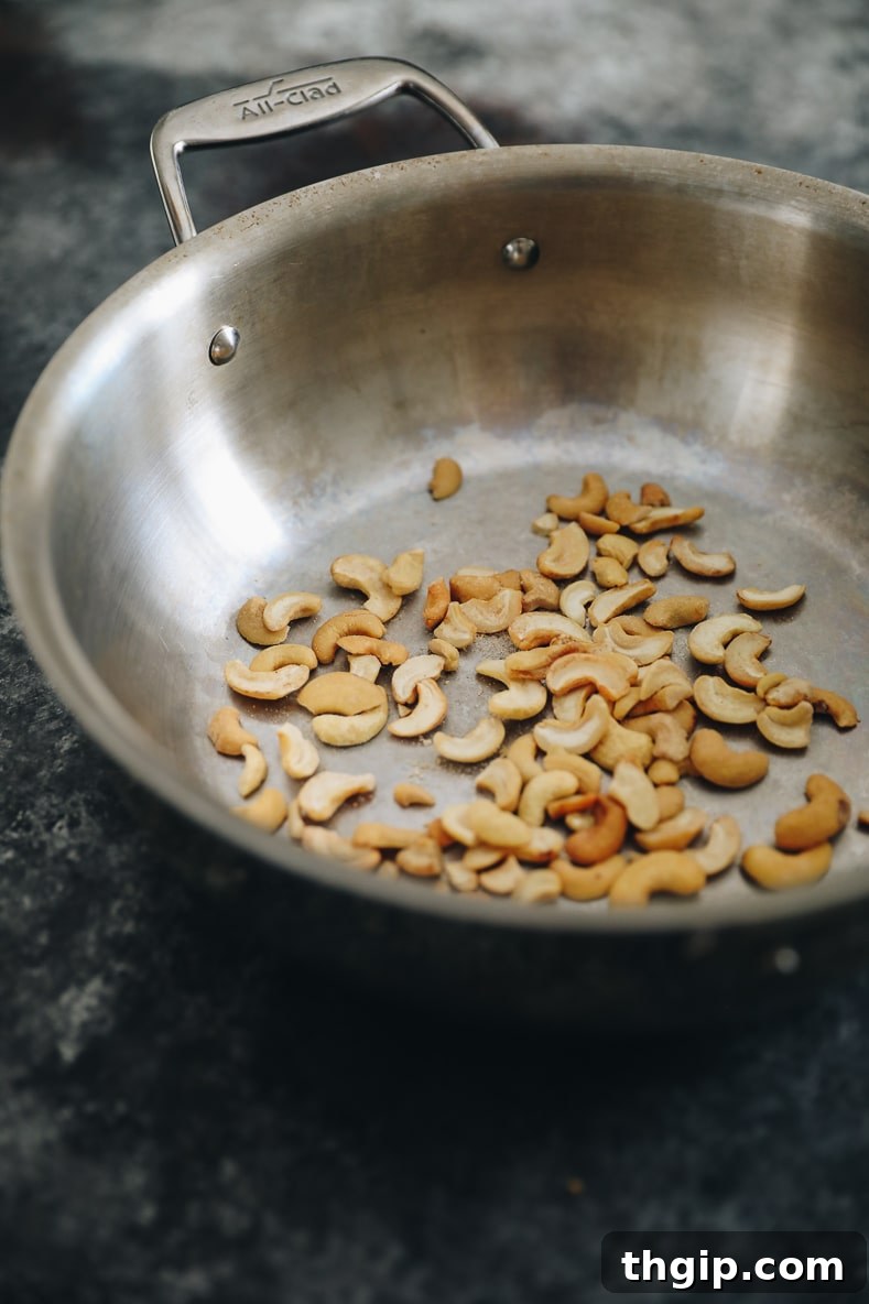 Cashews toasting in a pan