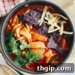 Instant Pot Chicken Enchilada Soup with toppings