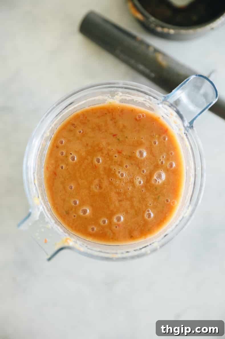 Simple Summer Gazpacho 5 Remaining vegetables and tomatoes blended into a smooth gazpacho base.