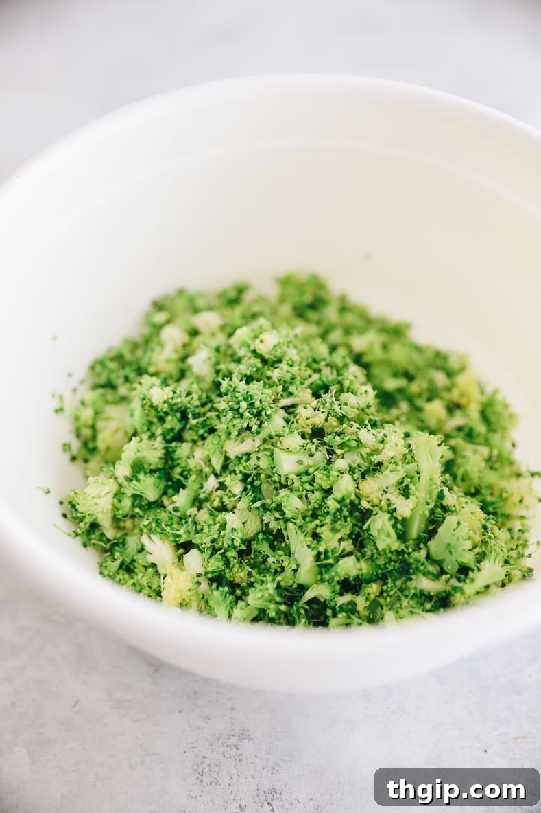 Crispy Broccoli Cheddar Bites 4 Finely chopped cooked broccoli ready for mixing.