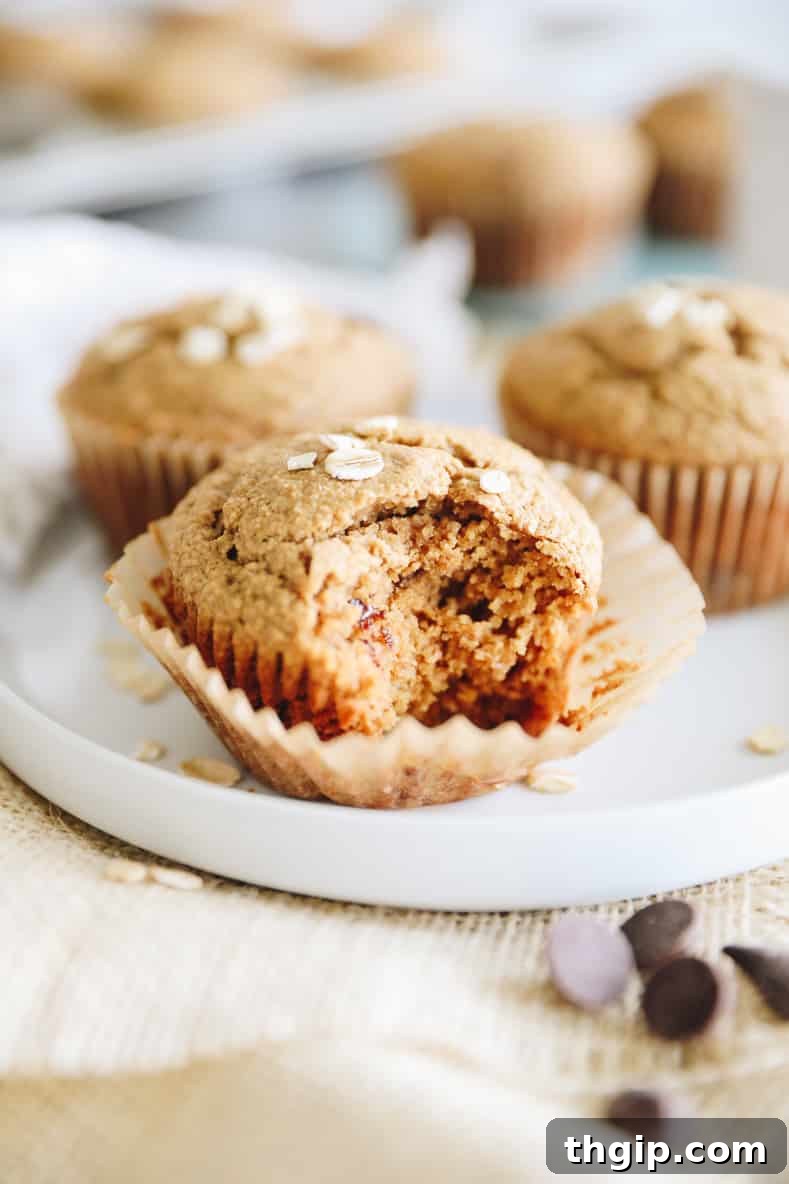Delicious and healthy oat flour muffins cooling on a wire rack, ready to be enjoyed.