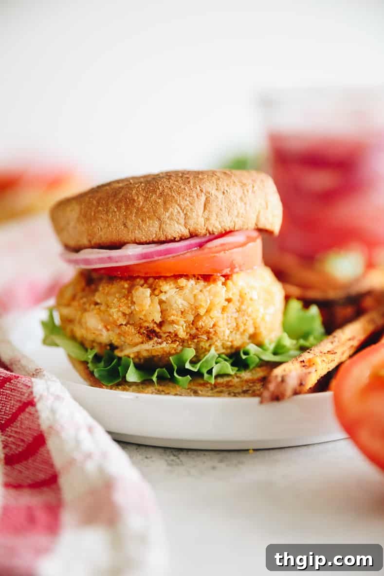 Wholesome Quinoa Veggie Burgers 2 A perfectly cooked quinoa burger on a bun, ready to be served.