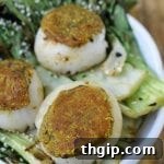Delicious Maple Pistachio Seared Scallops recipe thumbnail.