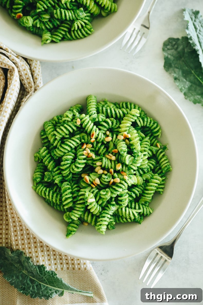Verdant Kale Pesto Pasta 9 A close-up shot of kale pesto pasta in a bowl, showcasing the vibrant green sauce and pasta texture.