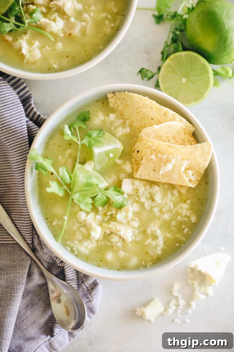 overhead photo of chicken pozole in a bowl