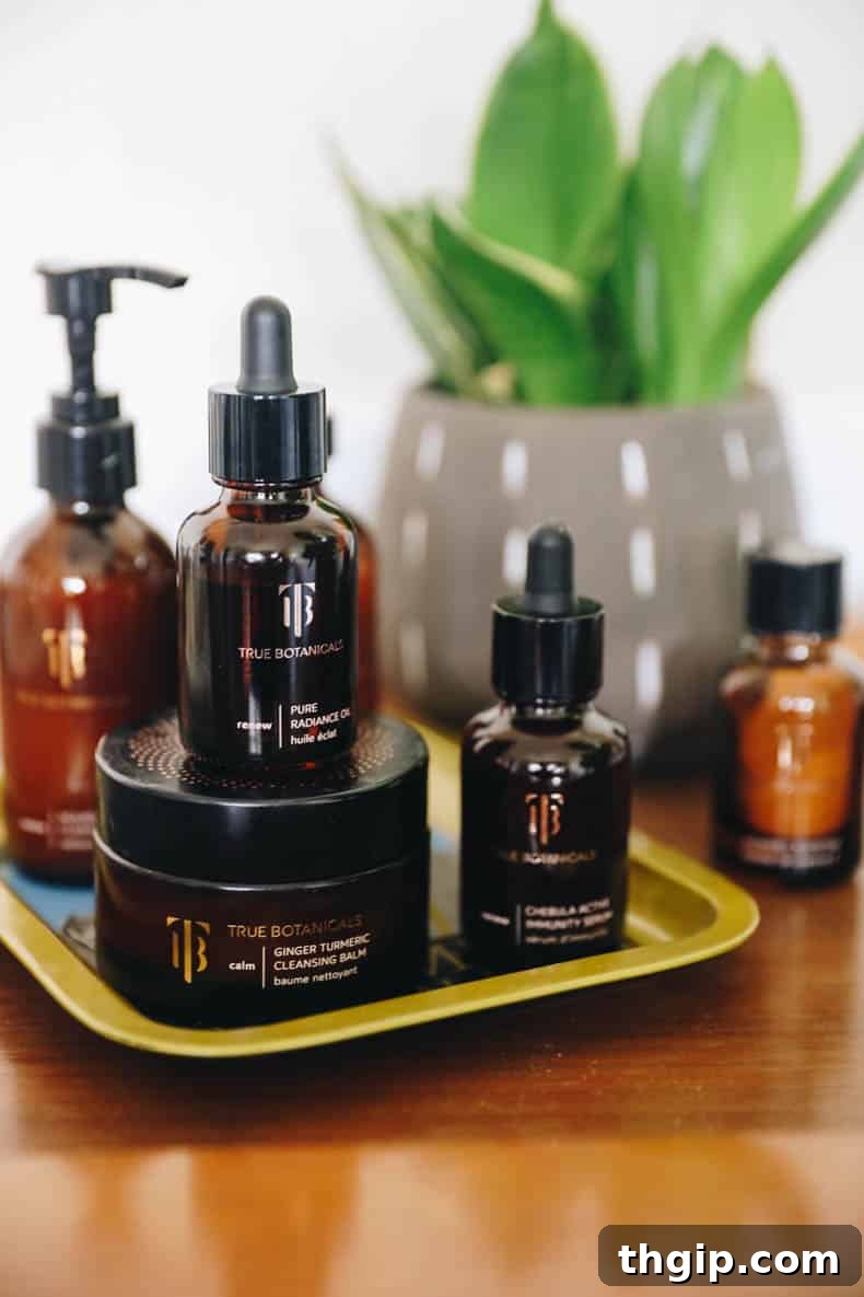 The Truth About True Botanicals 2 True Botanicals skincare products elegantly displayed, featuring various bottles and jars to illustrate a complete, luxurious clean beauty routine.
