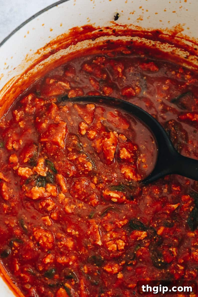 Savory Tofu Bolognese Pasta 6 Rich tofu bolognese simmering in a Dutch oven, ready to be combined with pasta.