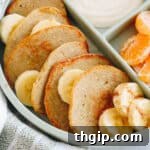 An easy recipe for baby pancakes made with just 4 simple ingredients, stacked on a plate.