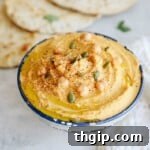 Roasted butternut squash hummus, a creamy and flavorful fall dip.