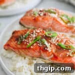 miso salmon recipe on a bed of rice.
