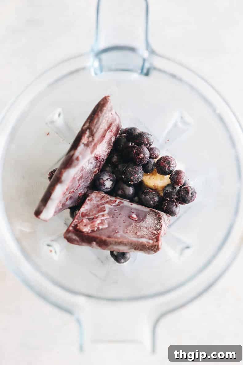 Superfood Acai Bliss Bowl 3 Acai bowl ingredients in a blender.