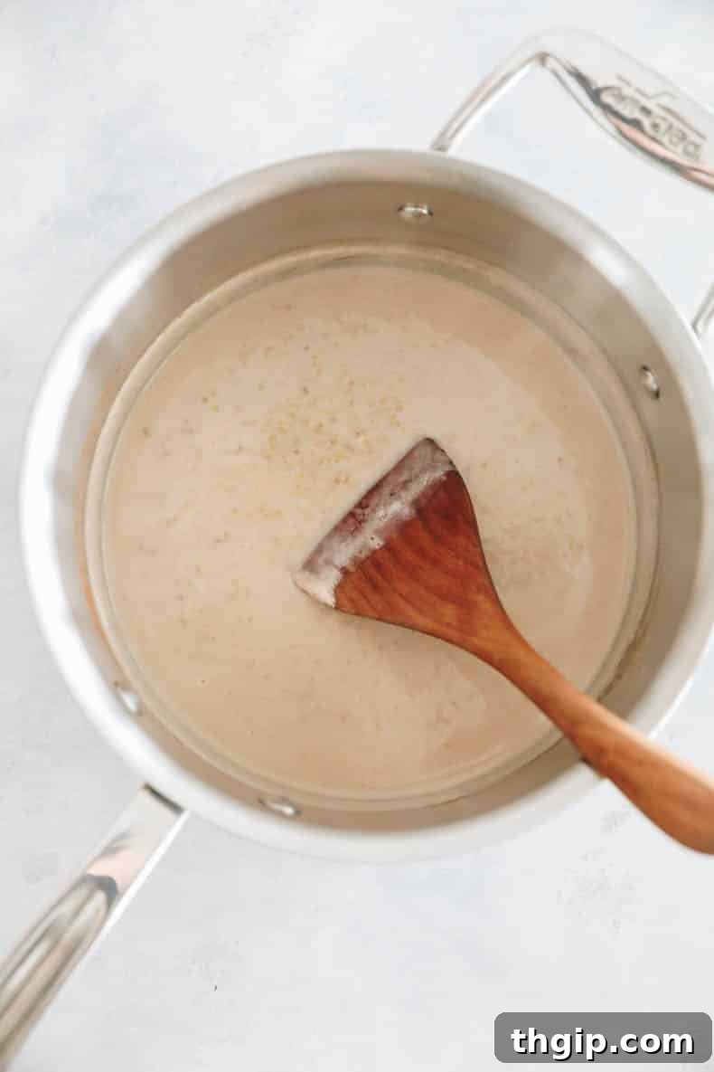 steel cut oats cooking in a saucepan