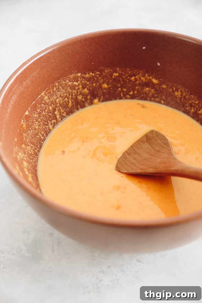 Golden Yam Griddlecakes 5 sweet potato, egg, almond milk and vanilla extract in a mixing bowl.