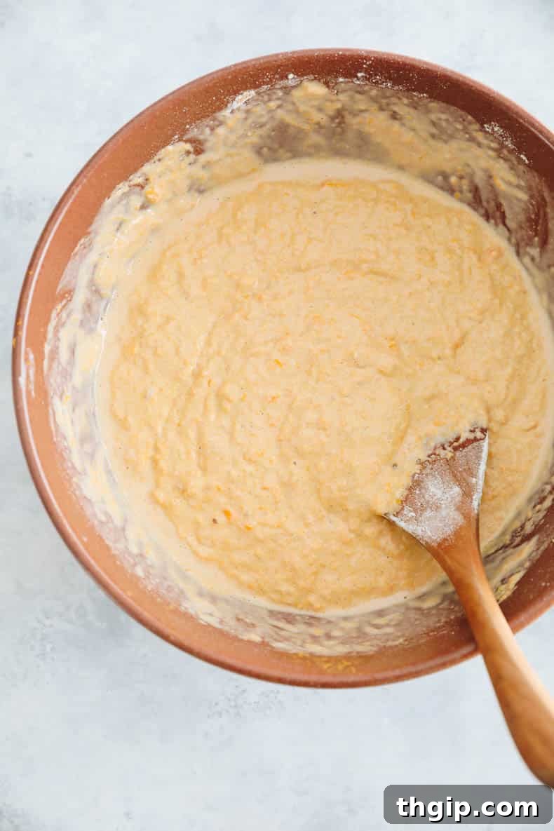 Golden Yam Griddlecakes 6 sweet potato pancakes batter in a mixing bowl.