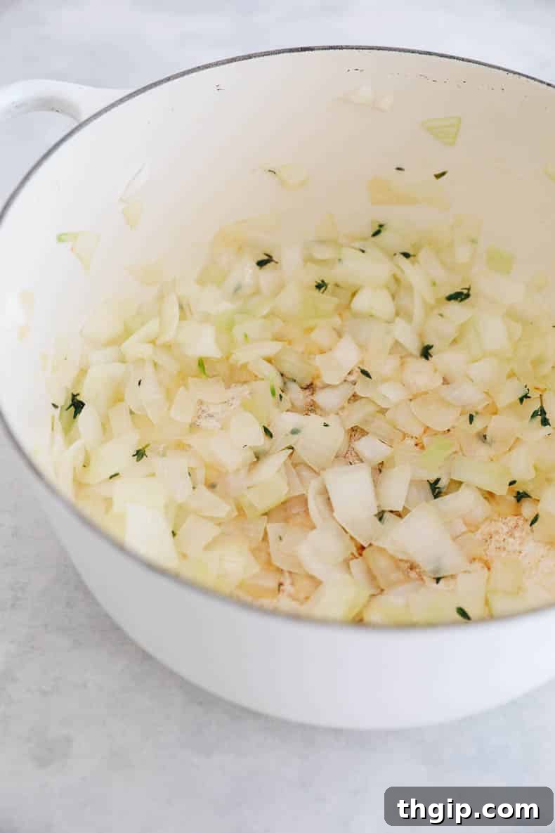 Golden Roasted Cauliflower Soup 4 Onion and thyme cooked in a pot