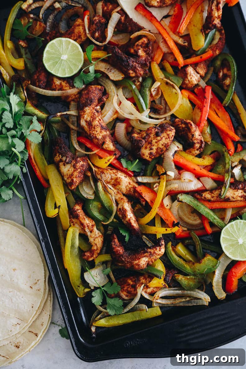 Effortless Fajita Feast 6 A colorful array of fajita toppings including sour cream, salsa, guacamole, and lime wedges.