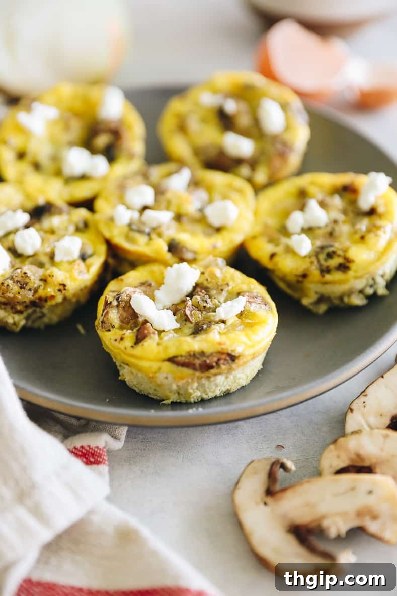 30 Creative Breakfasts Your Kids Will Love 8 A delicious plate of egg muffins topped with goat cheese, a savory breakfast option.