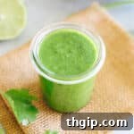 Cilantro lime dressing in a mason jar.