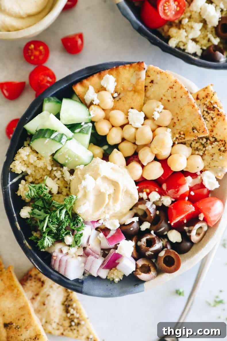 An overhead shot of a vibrant Mediterranean bowl, showcasing all the fresh, colorful ingredients perfectly arranged for a healthy and satisfying meal.