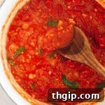 homemade tomato sauce in a large dutch oven.