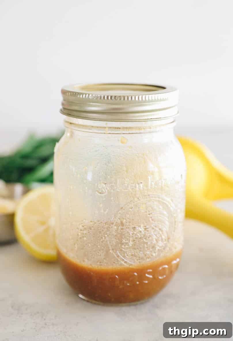 Vibrant Bean Delight 4 dressing for green bean salad in a small mason jar.
