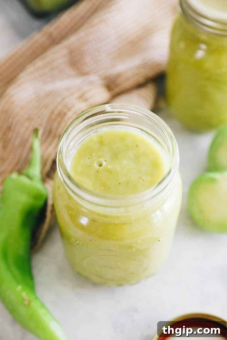 Zesty Green Enchilada Sauce 2 green enchilada sauce in a small pint mason jar.