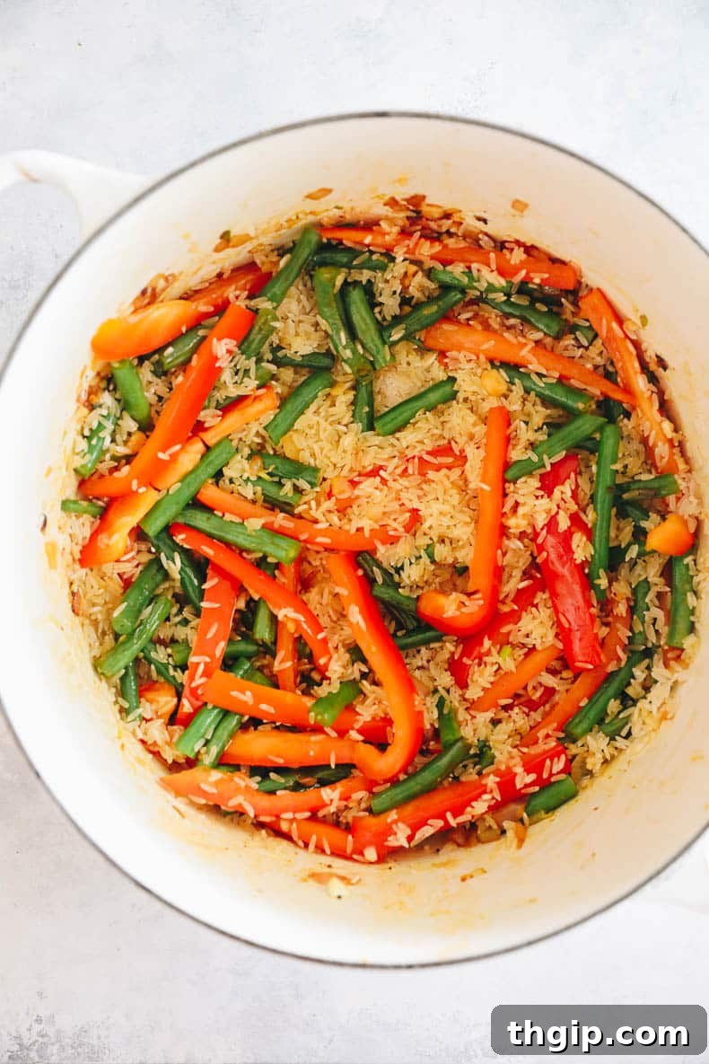 Effortless Skillet Chicken and Rice 5 veggies and rice in a dutch oven.