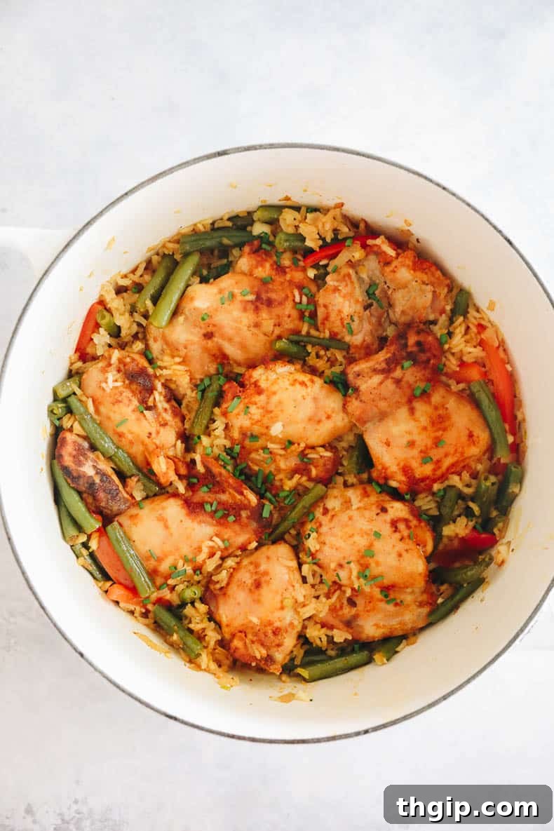 Effortless Skillet Chicken and Rice 6 one pot chicken and rice in a dutch oven.