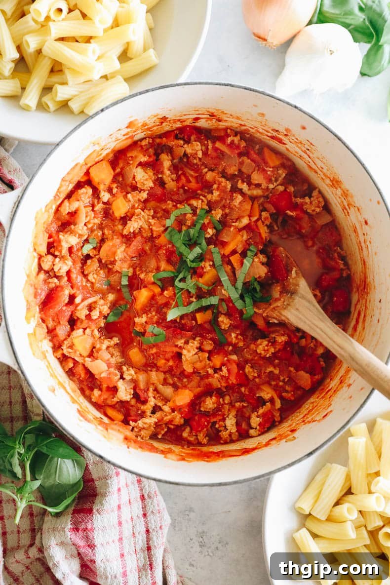 overhead image of a cooked pot of pasta sauce.