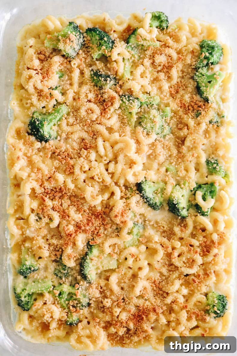 Wholesome Mac & Cheese 9 An inviting overhead image of the healthy baked mac and cheese in a baking dish, showcasing its golden crust and creamy interior.