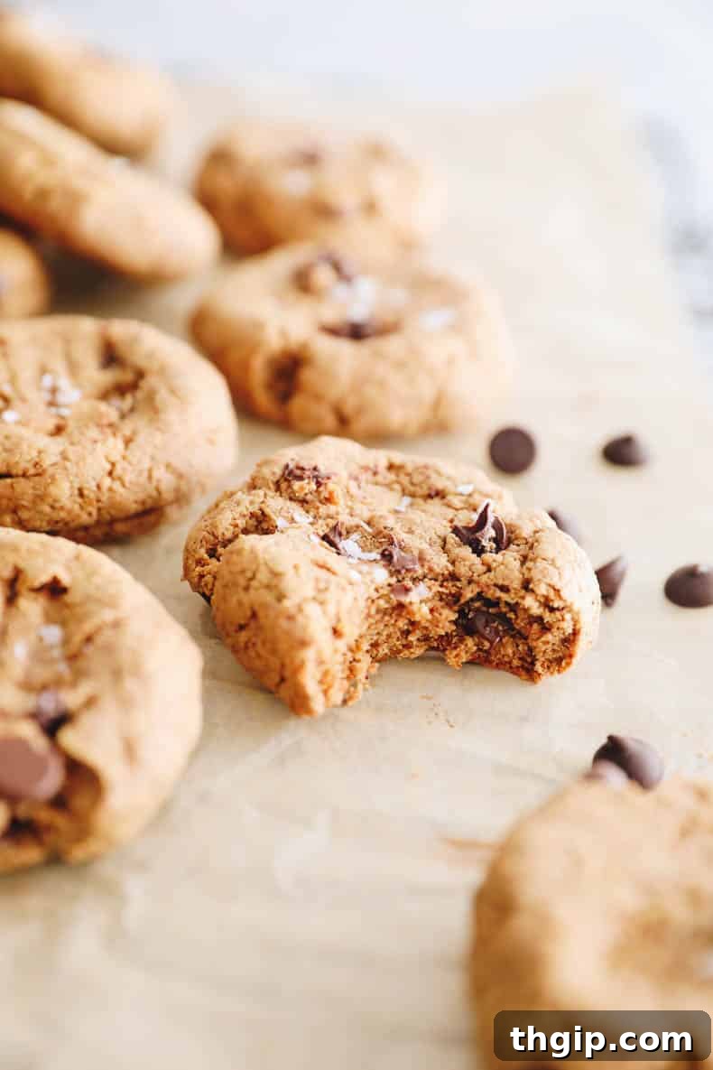 Energizing Protein Cookies 6 close up of a chocolate chip cookie with a bite taken out of it.