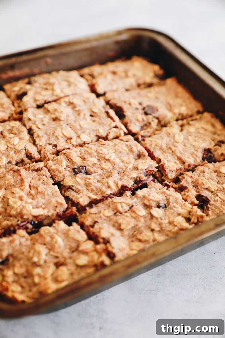 Baked breakfast bars cut into 12 squares in and 8 x 8 baking dish.